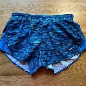 Women’s NIKE dri-fit running athletic shorts.